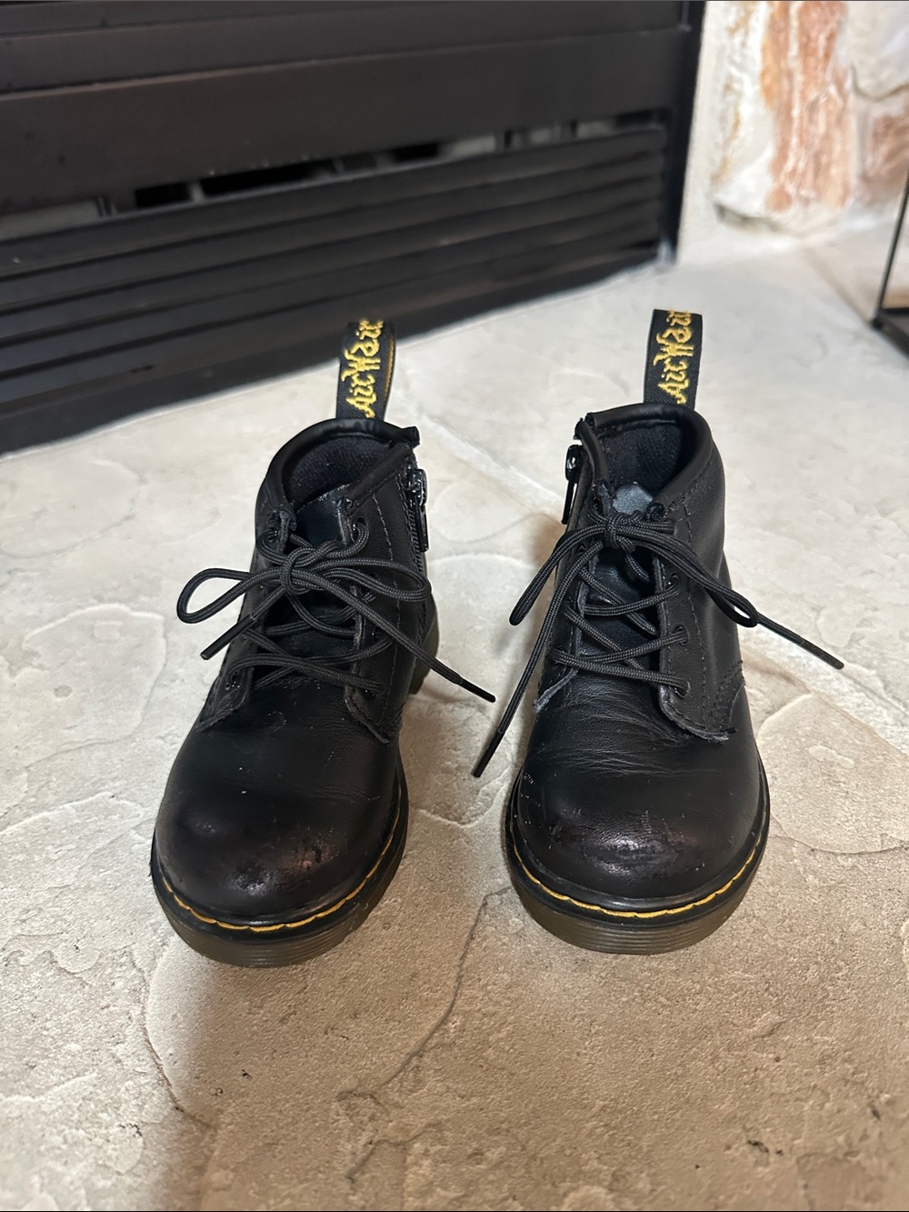 Dr. Martens Black Leather Ankle Boots with Yellow Stitching
